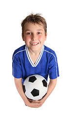 Image showing Boy holding soccer ball