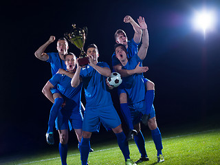 Image showing soccer players celebrating victory