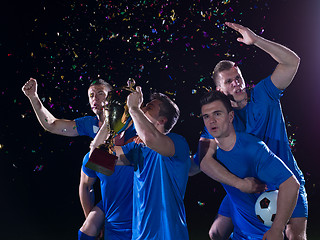 Image showing soccer players celebrating victory