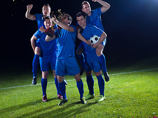 Image showing soccer players celebrating victory