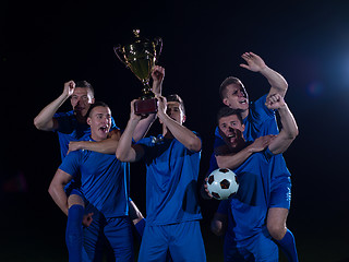 Image showing soccer players celebrating victory