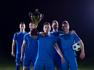 Image showing soccer players celebrating victory