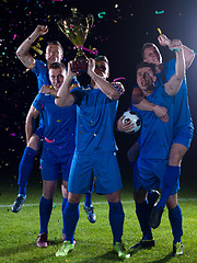 Image showing soccer players celebrating victory