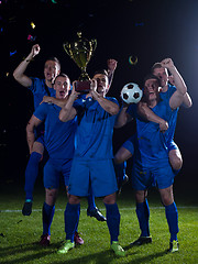 Image showing soccer players celebrating victory