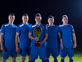 Image showing soccer players celebrating victory