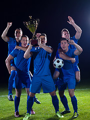 Image showing soccer players celebrating victory