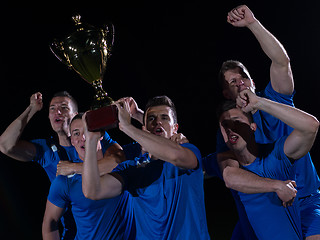 Image showing soccer players celebrating victory