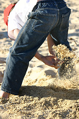 Image showing Scooping Sand