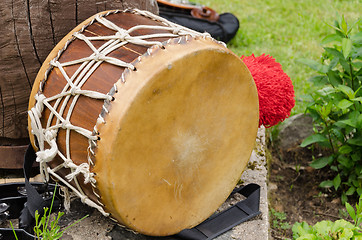 Image showing leather drum with African motifs outdoor 