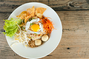 Image showing Thai Noodle Dish with Fried Egg