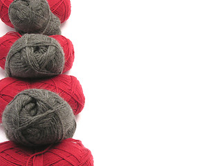 Image showing Gray and red new wool as left sideline on white background