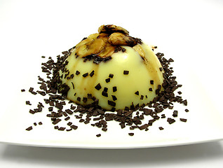 Image showing Custard with sliced banana and grated chocolate