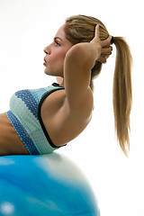 Image showing Woman doing sit ups