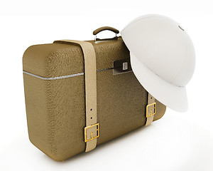 Image showing Brown traveler's suitcase and peaked cap 