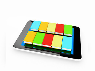 Image showing tablet pc and colorful real books