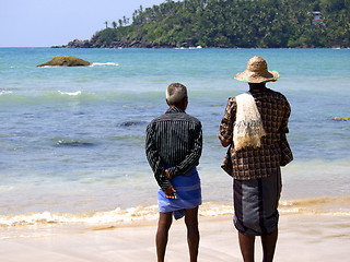 Image showing Fishermen looking at the Indian ocean