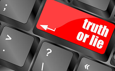 Image showing truth or lie button on computer keyboard key