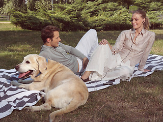 Image showing couple with dog