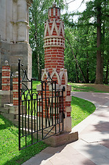 Image showing Wicket of red brick decorated with white pattern