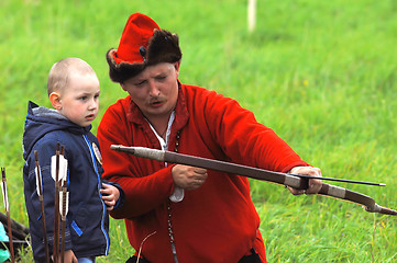 Image showing Teacher archery