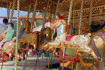 Image showing Riding the Carousel