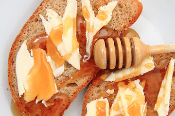 Image showing bread, butter and fresh honey 