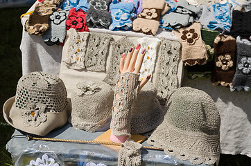 Image showing female linen hats and wristlets at market trade 