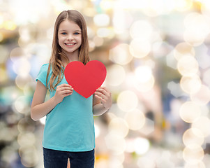 Image showing smiling little girl with red heart