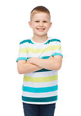 Image showing little boy in casual clothes with arms crossed