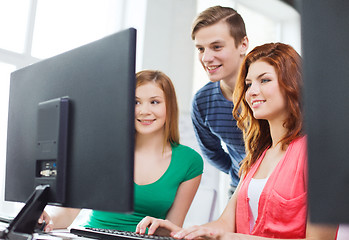 Image showing group of smiling students having discussion