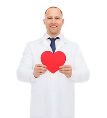 Image showing smiling male doctor with red heart