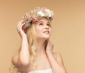 Image showing woman wearing wreath of flowers