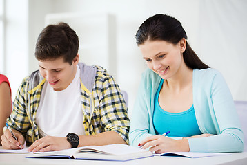 Image showing students with textbooks and books at school