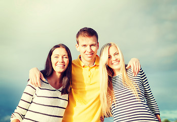 Image showing group of friends having fun on the beach