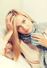 Image showing diseased woman with cup of tea