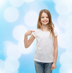 Image showing smiling little girl in blank white t-shirt