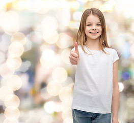 Image showing girl in blank white t-shirt showing thumbs up