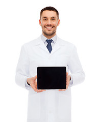 Image showing smiling male doctor with tablet pc