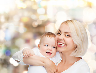 Image showing happy mother with smiling baby