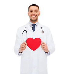 Image showing smiling male doctor with red heart