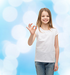 Image showing little girl in white t-shirt showing ok gesture