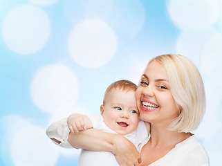 Image showing happy mother with smiling baby