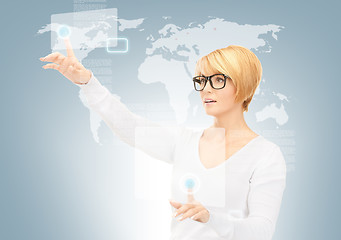 Image showing businesswoman working with touch screen