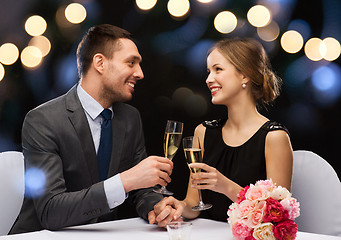 Image showing couple with glasses of champagne at restaurant