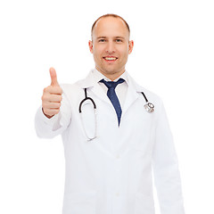 Image showing smiling doctor with stethoscope showing thumbs up