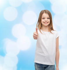 Image showing girl in blank white t-shirt showing thumbs up