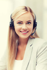 Image showing friendly female helpline operator