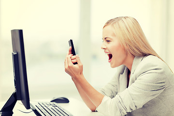 Image showing angry woman with phone