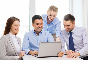 Image showing business team working with laptop in office