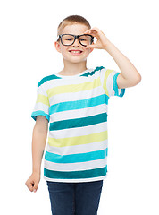 Image showing smiling little boy in eyeglasses